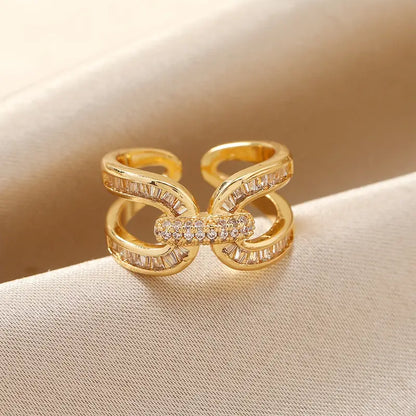 Golden Plated Geometric Cross Ring with Cubic Zirconia