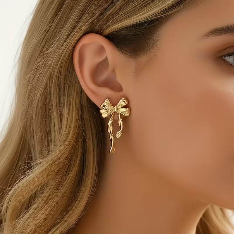 Fashionable Commuter 3D Golden Bow Earrings