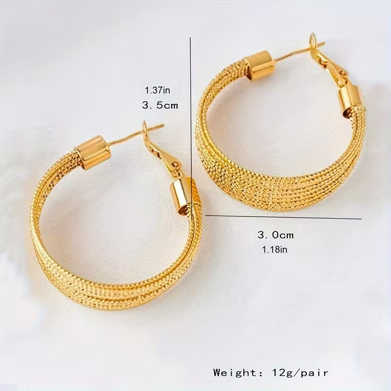 A Pair of Vintage-Style Women'S Earrings with a Geometric Iron Texture