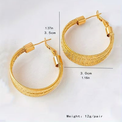 A Pair of Vintage-Style Women'S Earrings with a Geometric Iron Texture