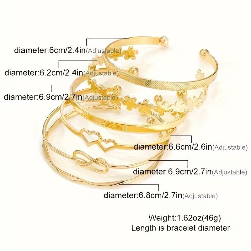 A Set Of Six Fashionable Golden Open Cuff Bracelets For Women