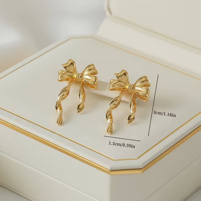 Fashionable Commuter 3D Golden Bow Earrings