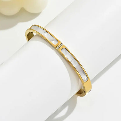 Golden Plated Stainless Steel Bangle with Rhinestones and Gemstones