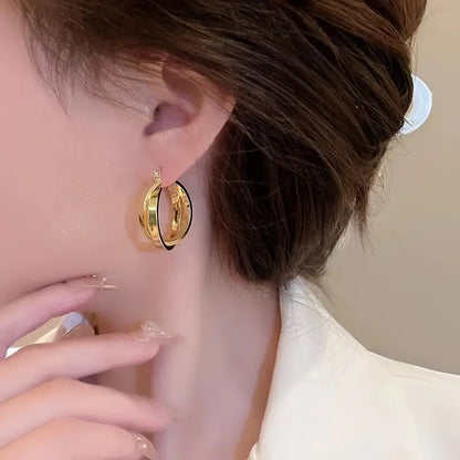 Metal Hoop Earrings Similar to Those Worn by Popular Influencers